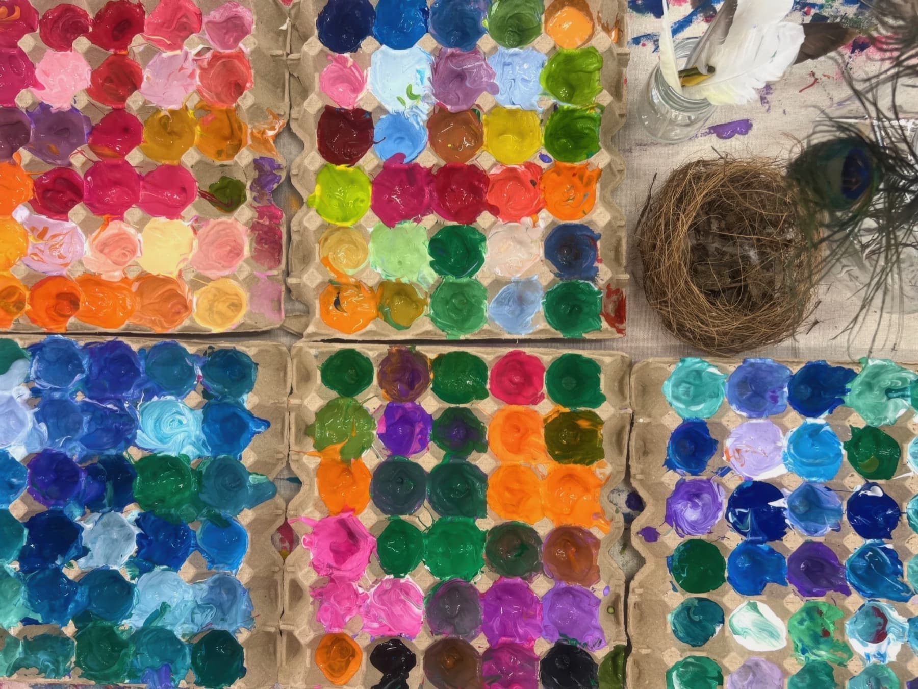Colourful egg carton paints with nest