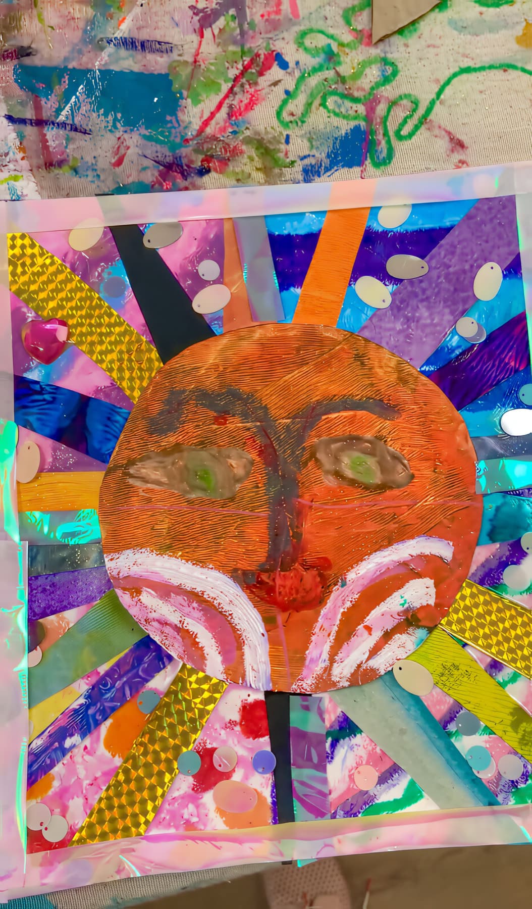 Colourful sun face collage