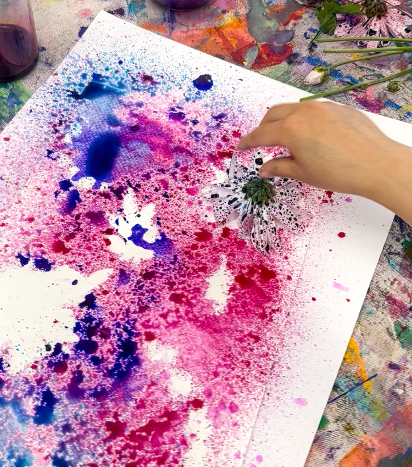 Pink splash art with flower stamp